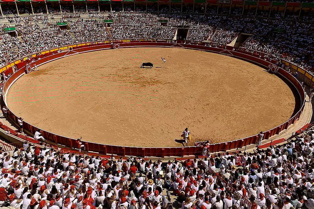 | Photo: AP/Alvaro Barrientos : Spain Running of the Bulls